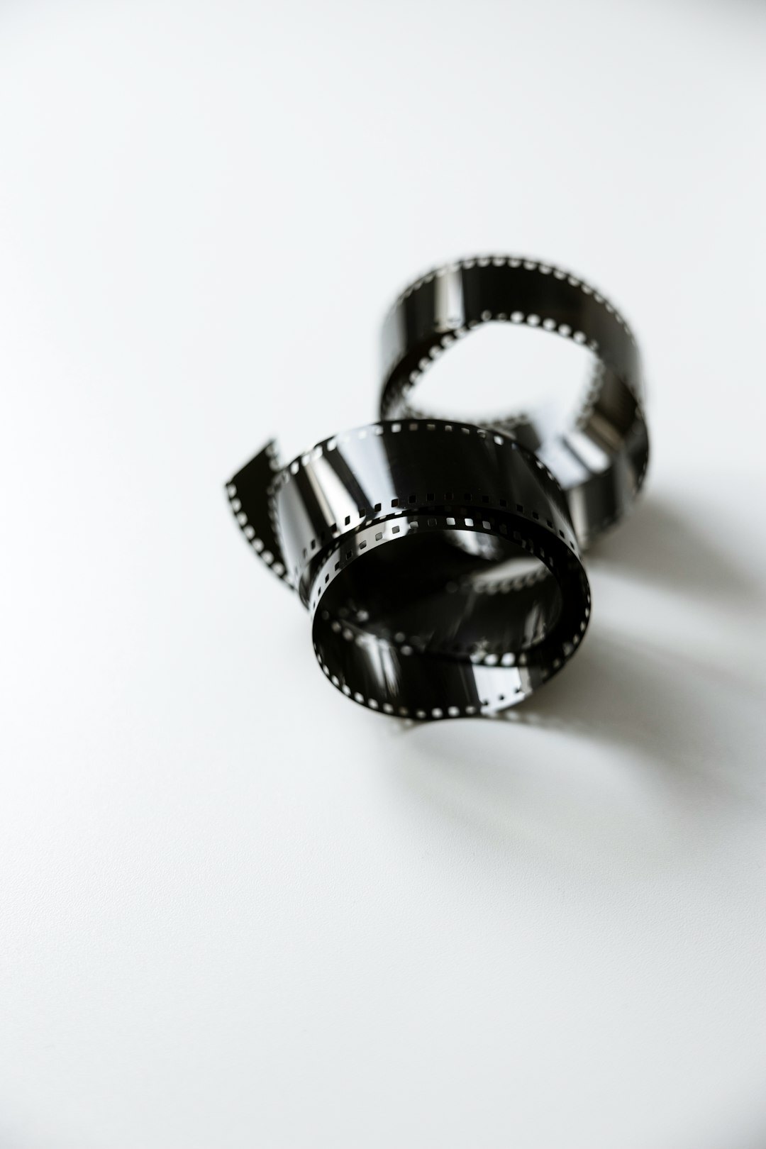 Stack of analogue film reels used for editing television commercials
